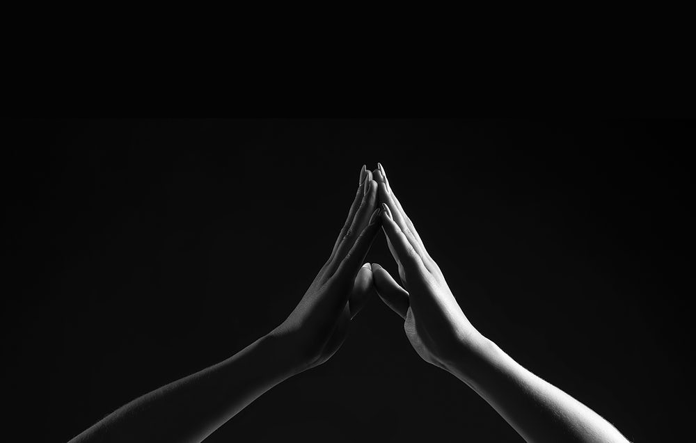 Two hands touching